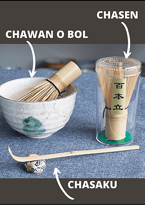 a bowl and bowl with bamboo whisk in a container